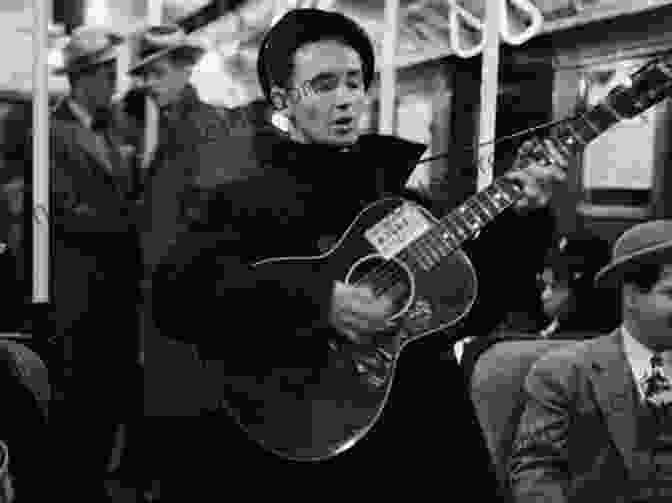 A Black And White Photo Of Woody Guthrie Performing On Stage With His Guitar, Surrounded By An Audience. Woody Guthrie: Songs And Art * Words And Wisdom